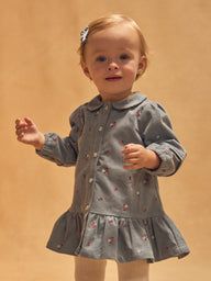 Синьо-сива рокля с цветен принт за бебе момиче