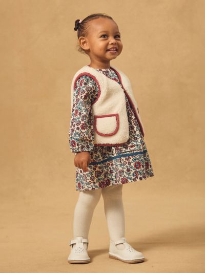 Двулицев елек в червено или екрю за бебе момиче