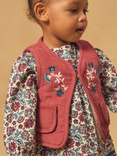 Двулицев елек в червено или екрю за бебе момиче