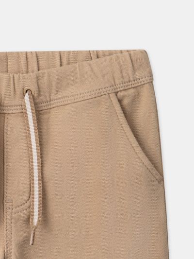 Бежов карго панталон за момче